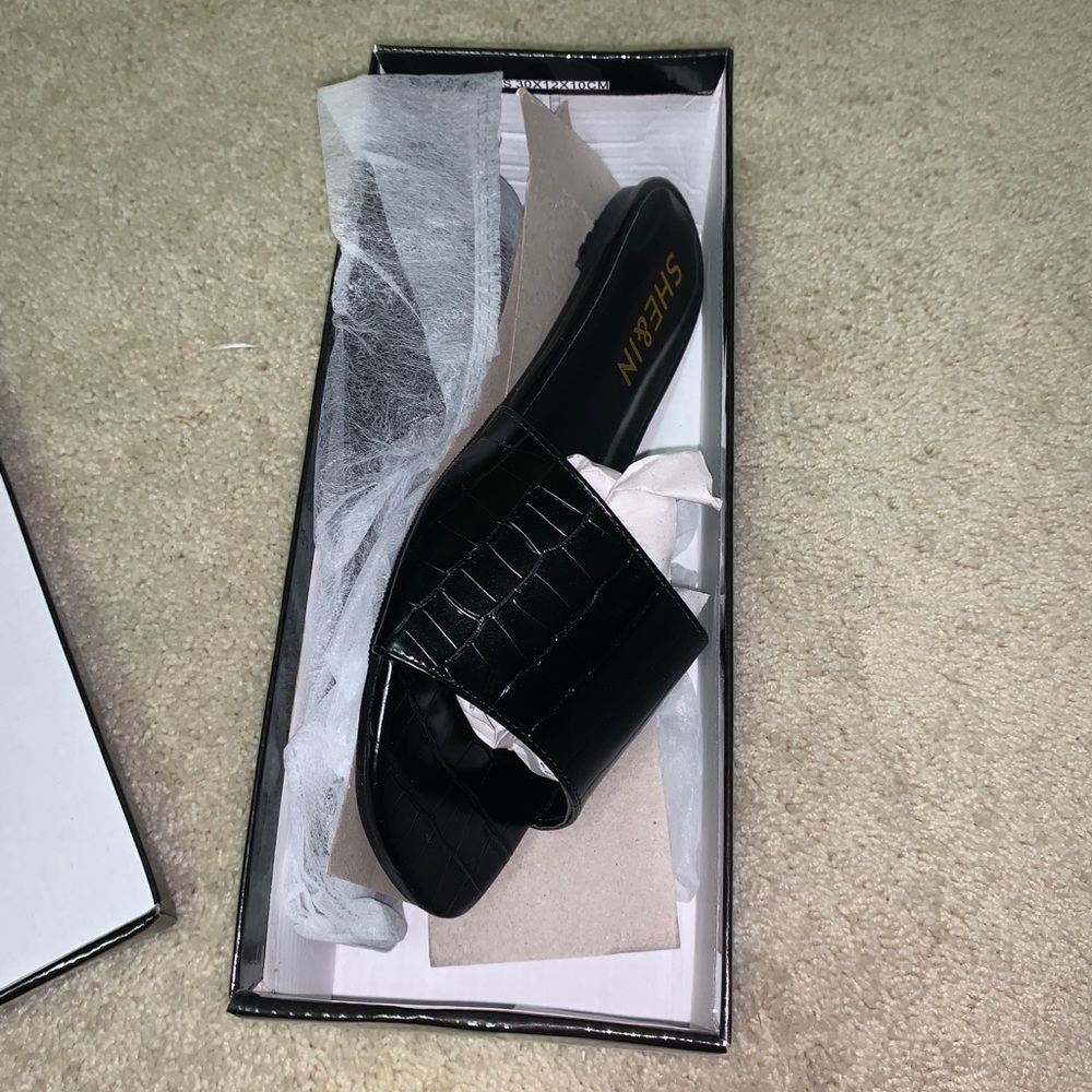 Black leather sandals